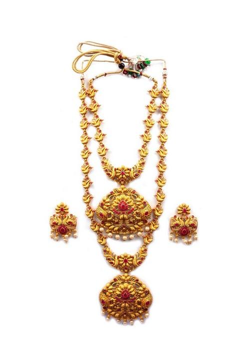 Gold Plated Red Stone Studded And Beaded Jewellery Set