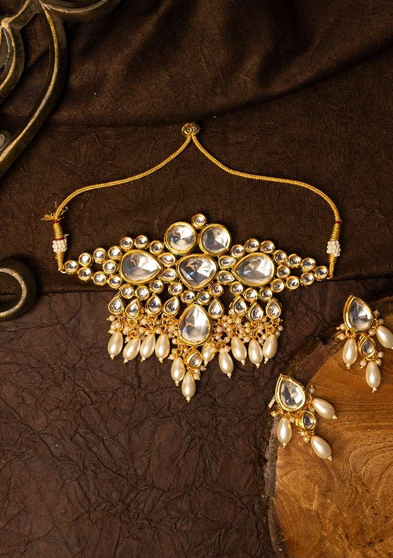 Gold Pleated Kundan Stone Studded and Pearls Beaded Jewellery Set - Indya