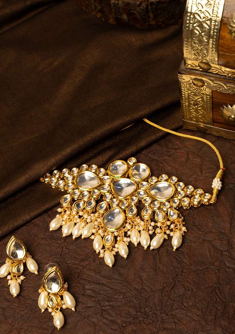 Gold Pleated Kundan Stone Studded and Pearls Beaded Jewellery Set - Indya