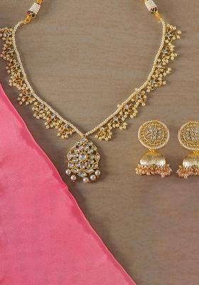 Golden White Designer Brass Kundan Necklace With Earring Set