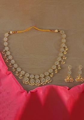 Golden White Designer Brass Kundan Necklace With Earring Set