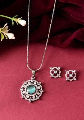 Silver Plated Sea Green Circulare Stone Studded Sun Shaped Ad Pandent With Chain Set 