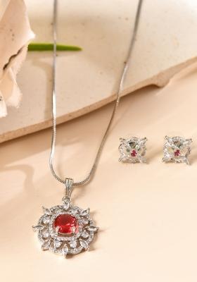 Silver Plated Ruby Red Circulare Stone Studded Sun Shaped Ad Pandent With Chain Set 