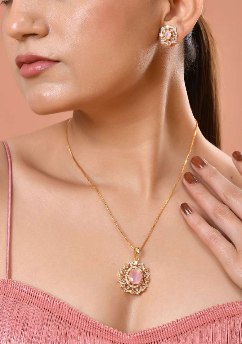 Gold Toned Baby Pink Oval Stone Studded Sun Shaped Ad Pandent With Chain Set  - Indya