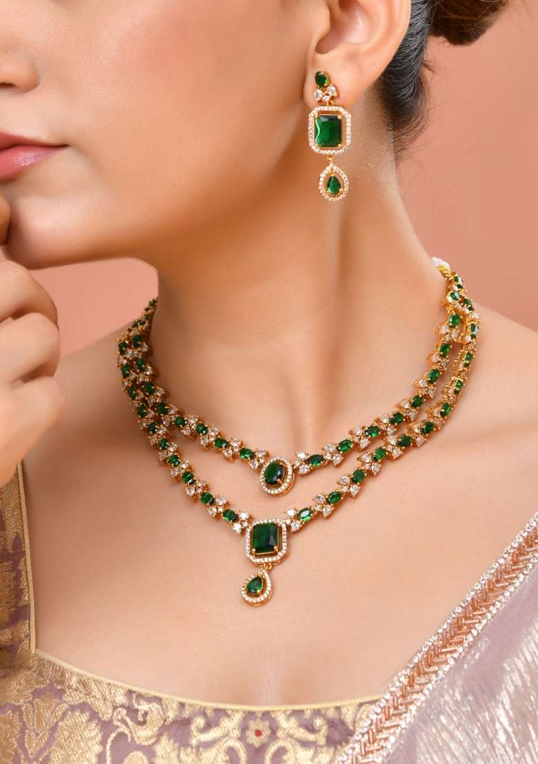 Gold Plated Dual Layer Green Stone Studded Jewellery Set - Indya