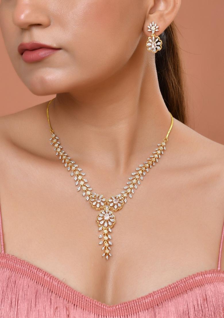 Gold Plated Lead Designed With White Stone Ad Jewellery Set - Indya