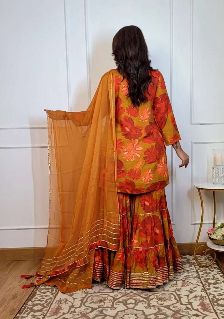 Orange Sharara Set in Pure Muslin with Gota Patti and Mirror Work - Indya