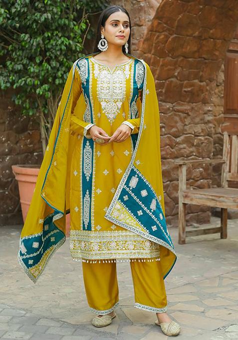 Dazzling Wine Embroidered Chinnon Palazzo Salwar Kurta