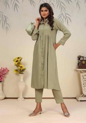 Brown Solid Cotton Salwar Kameez