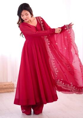 Rani Pink Solid Silk Salwar Kameez With Dupatta