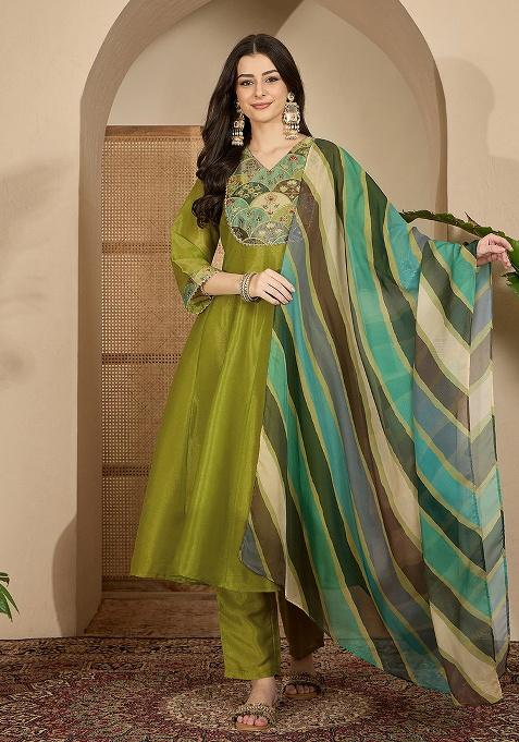 Parrot Green Embroidered Georgette Pakistani Suit Set — view on Indya