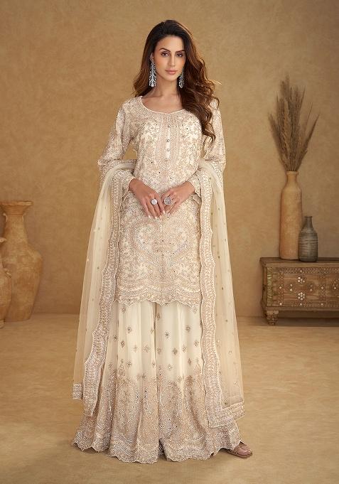 Off White Embroidery Net Salwar Kameez — view on Indya
