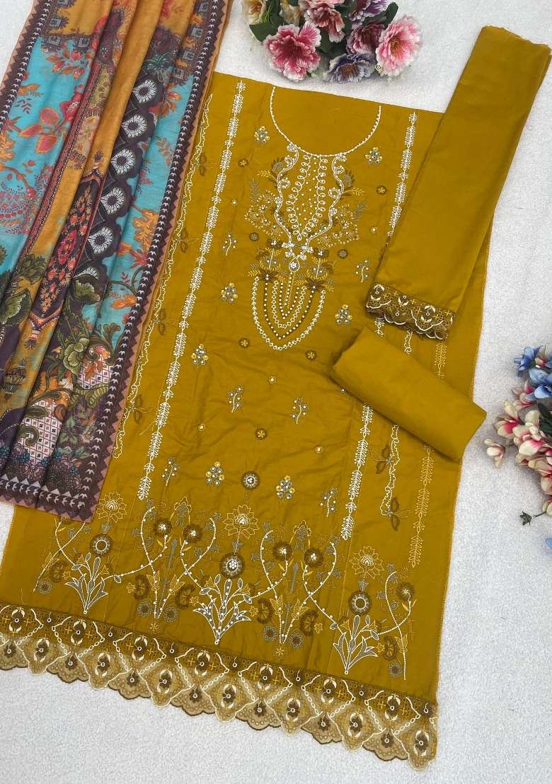 Yellow Embroidered Cambric Salwar Kameez - Indya