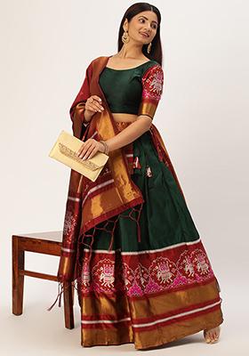 Deep Green Woven Design Zari Embroidered Silk Lehenga Set