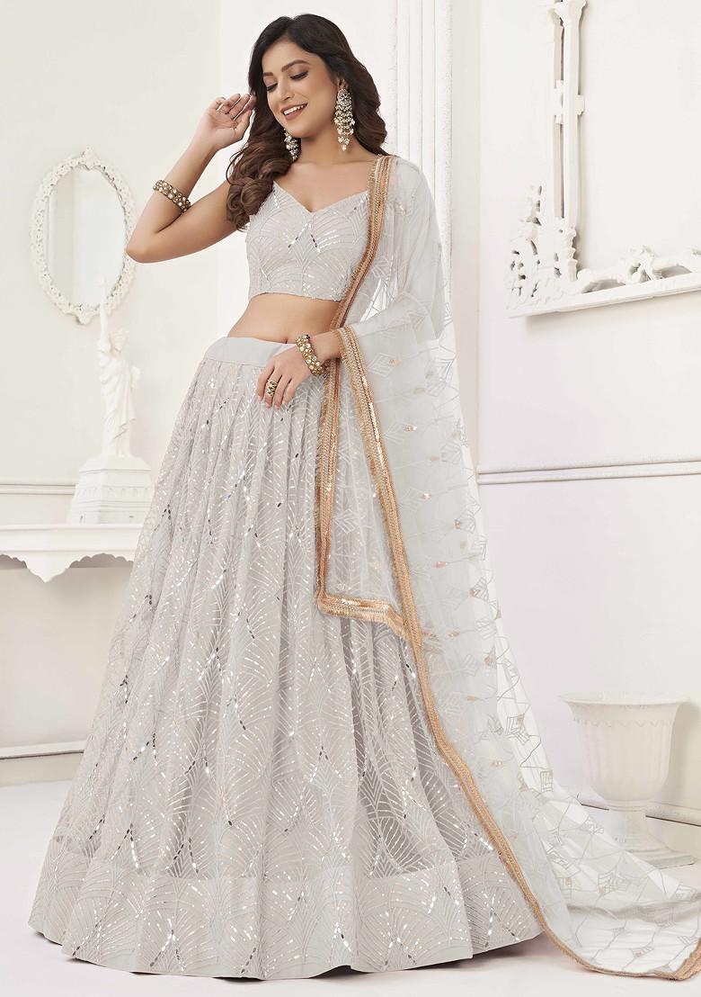 Off White Sequin Thread Embroidered Net Lehenga