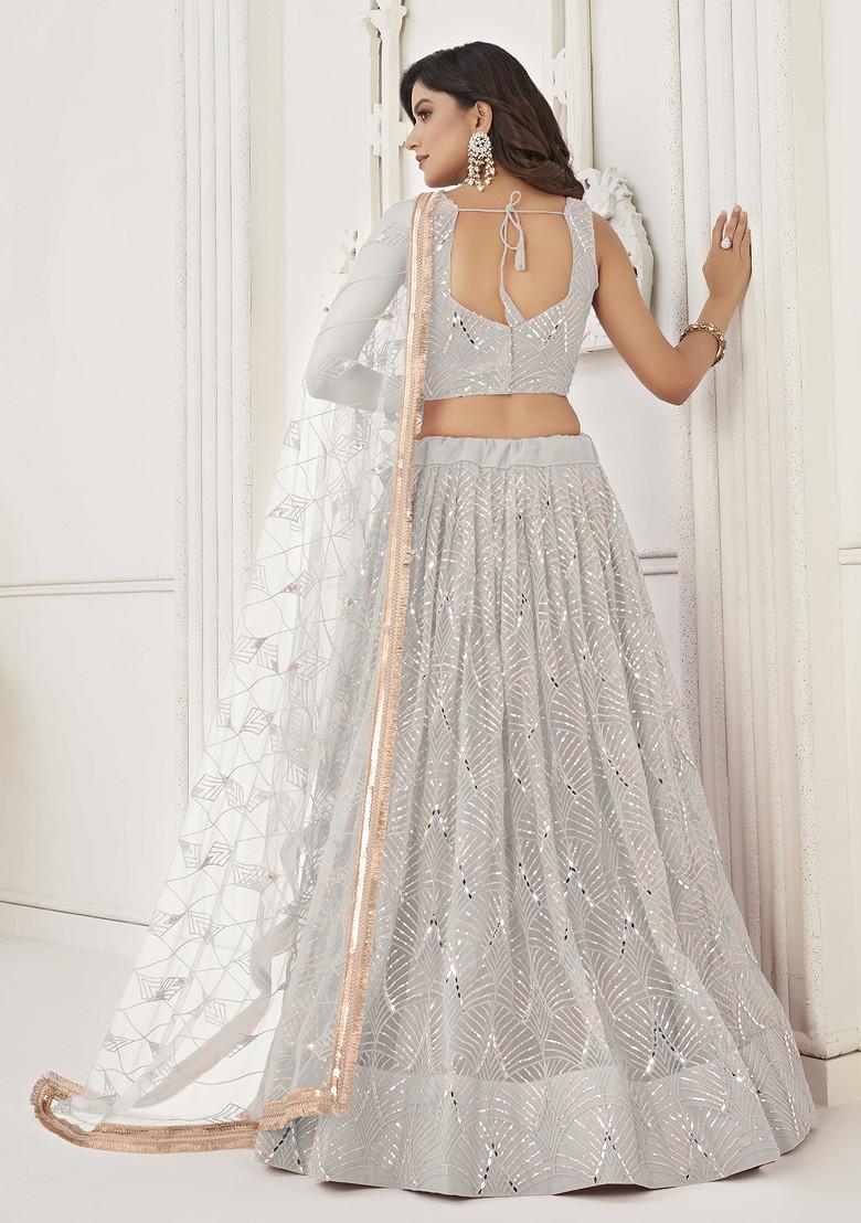 Off White Sequin Thread Embroidered Net Lehenga