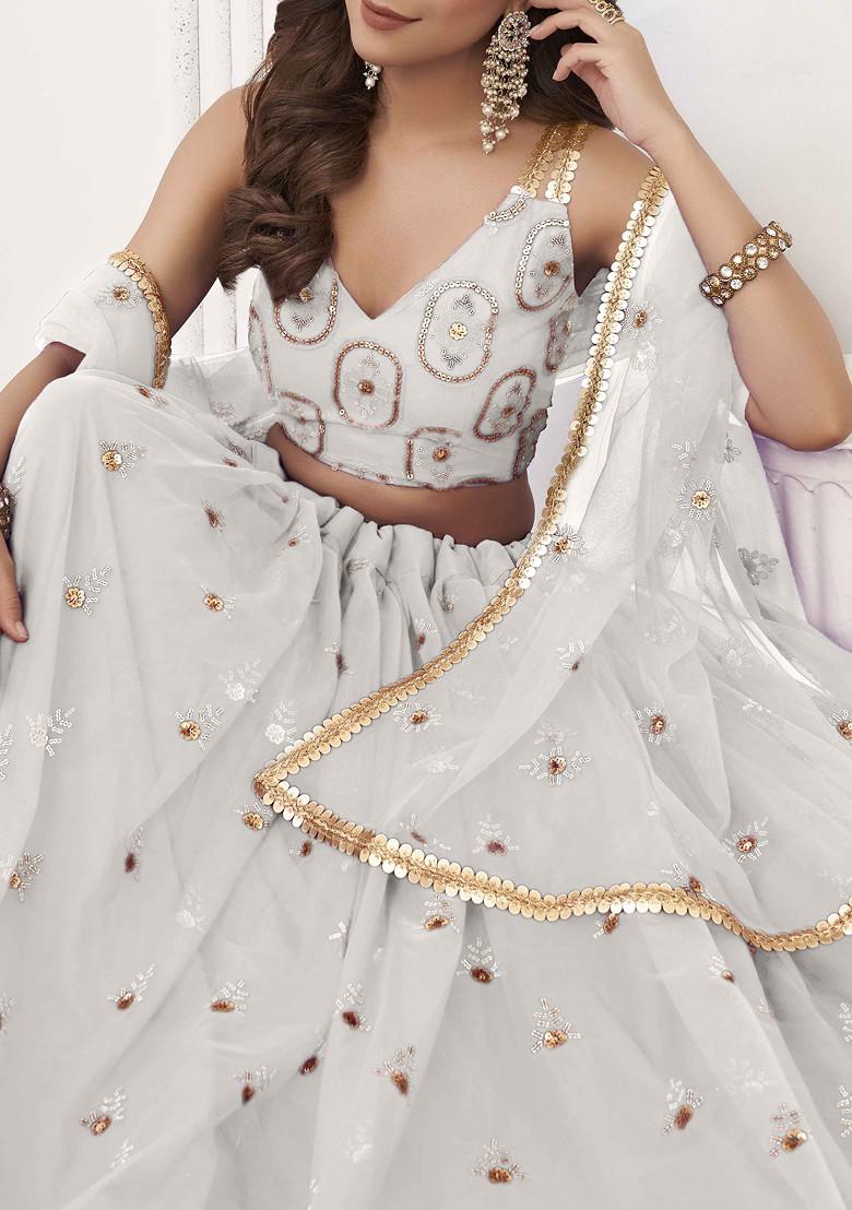 Off White Thread Sequin Embroidered Net Lehenga