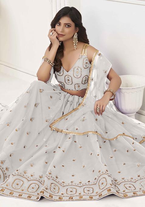 Off White Thread Sequin Embroidered Net Lehenga