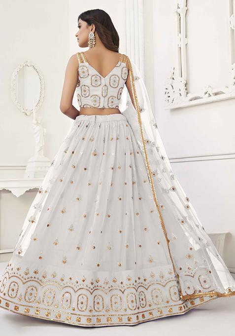 Off White Thread Sequin Embroidered Net Lehenga