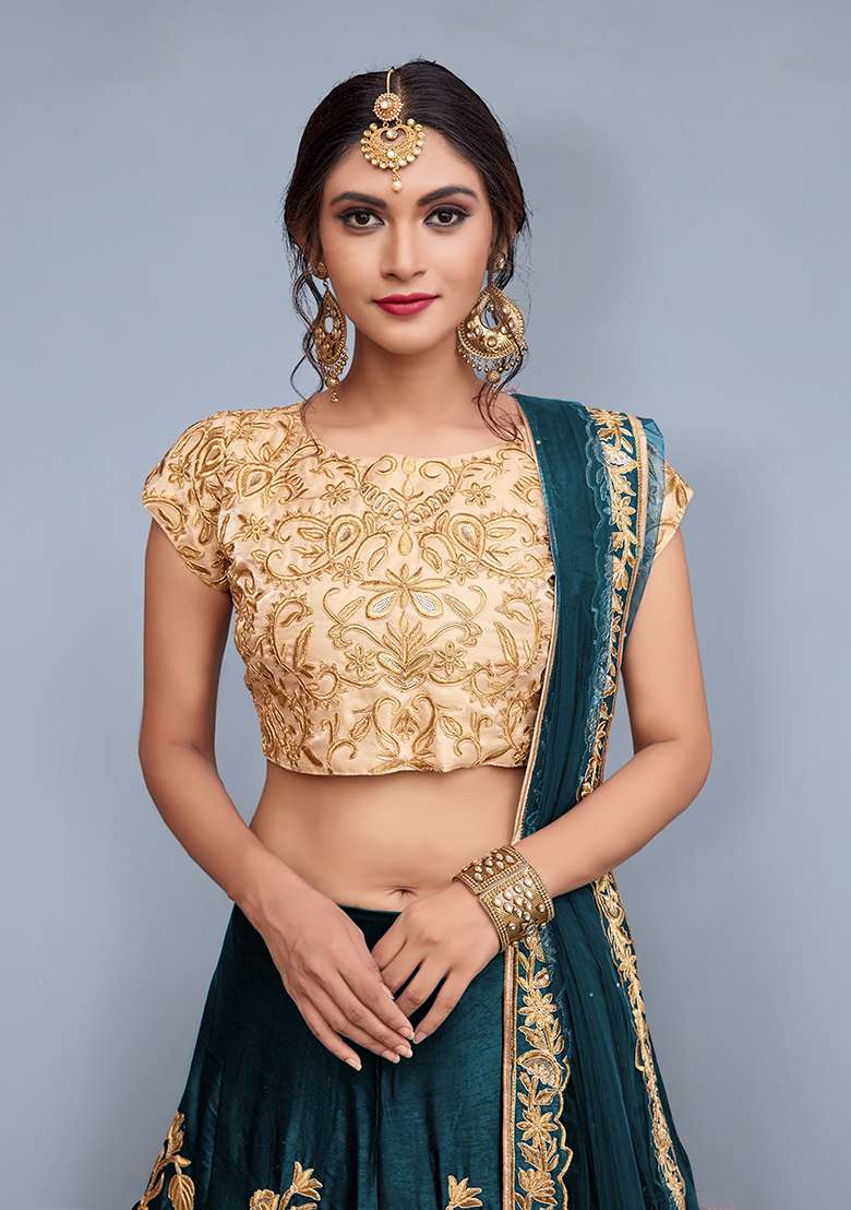 Turquoise Embroidered Velvet Lehenga Set for Diwali and Festive Wear - Indya