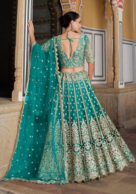 Teal Green Zari Thread Embroidered Net Lehenga Set