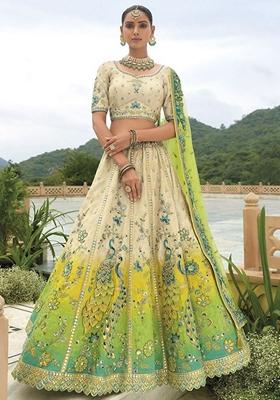 Cream And Green Embroidered Heavy Silk Lehenga Set