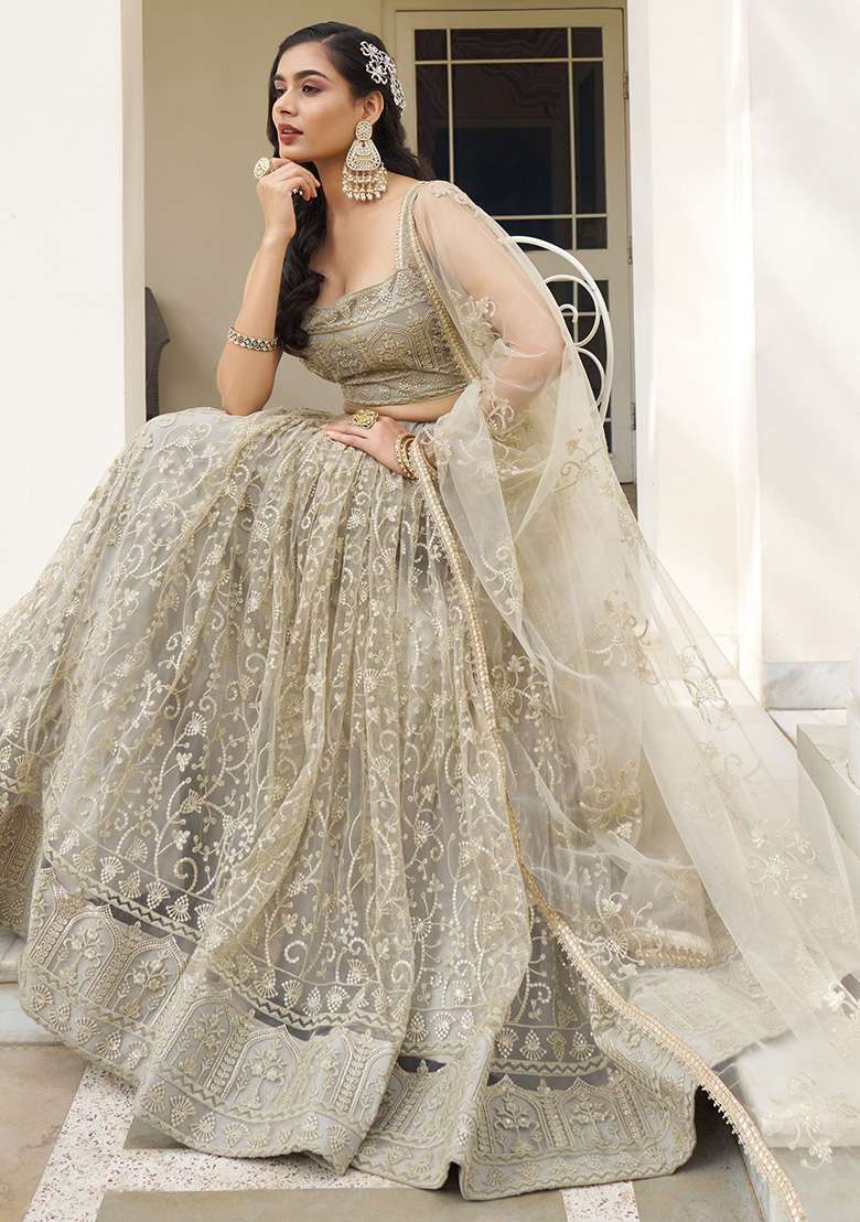 Ivory Sequin Embroidered Net Lehenga Set for Diwali and Festive Wear - Indya