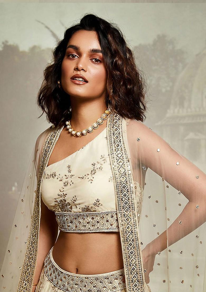 Cream Embroidered Poly Blend Lehenga Sets