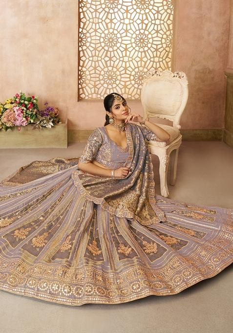 Handcrafted Light Onion Pink Lehenga Set with Gold Stripes.