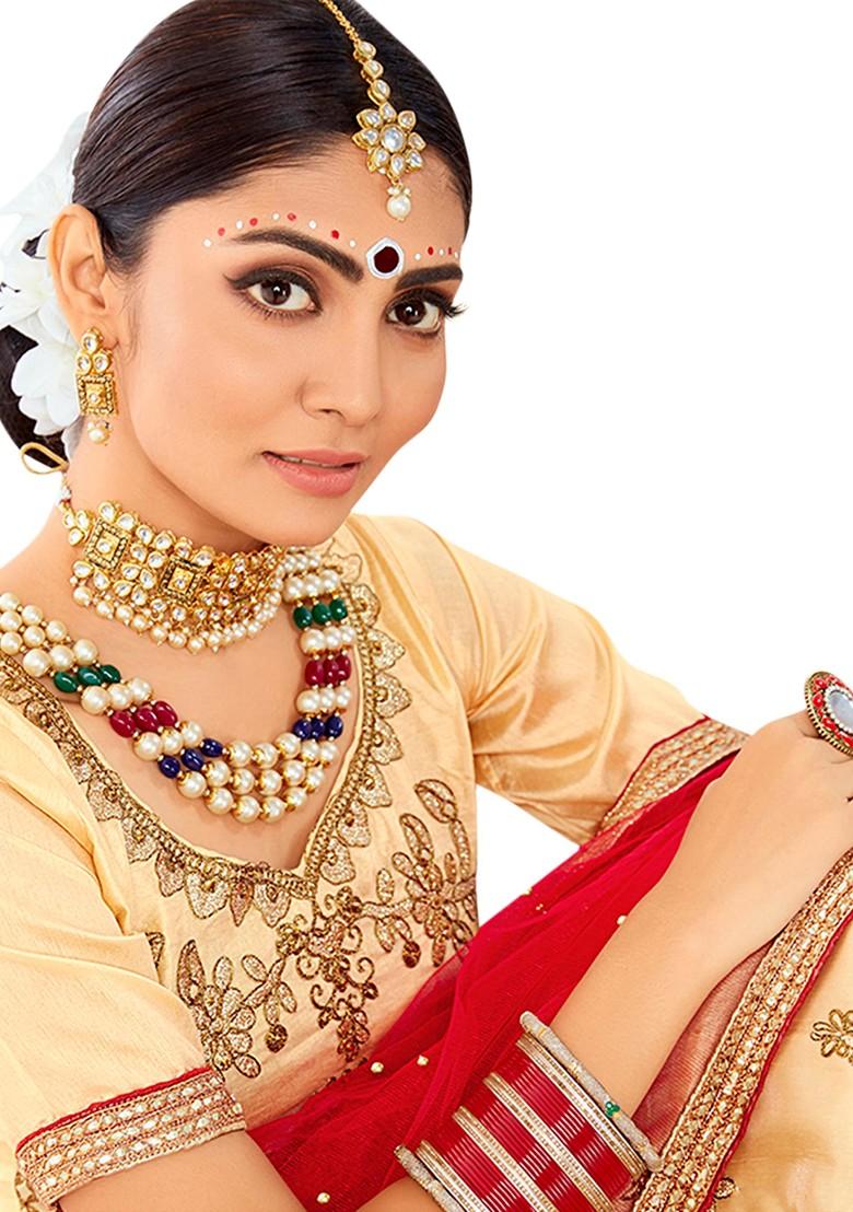 Beige Embroidered Silk Lehenga Set