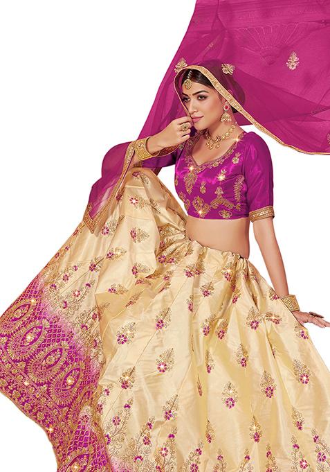 Beige And Magenta Embroidered Satin Silk Lehenga Set