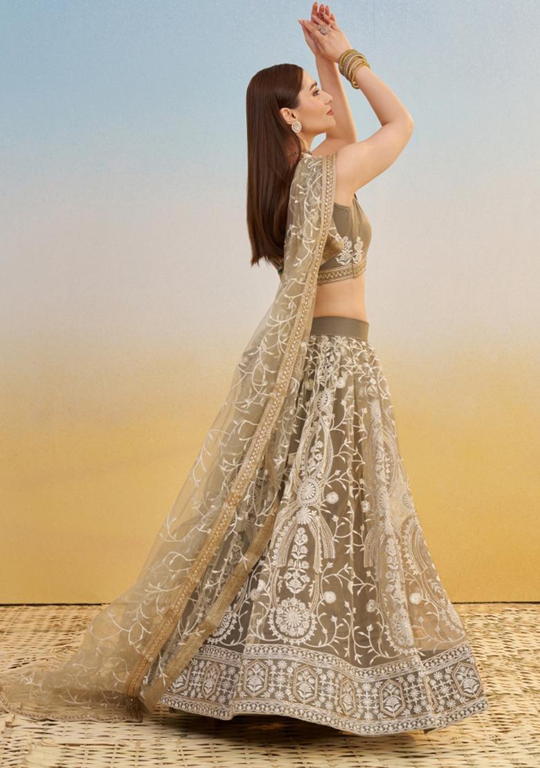 Ivory embroidered Net Lehenga Set With Dupatta