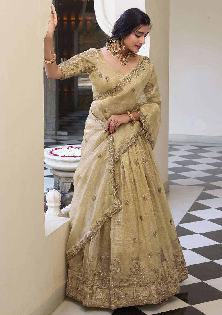 Cream Sequence Embroidered Gold Cursh Lehenga Set With Dupatta for Diwali and Festive Wear - Indya