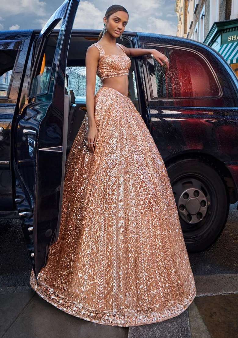 Golden Sequence Work Net Lehenga Set for Diwali | Wedding & Festive Wear - Indya