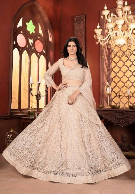 White Embroidery Net Lehenga Set — view on Indya