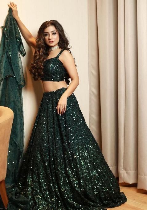 Green Embroidery Silk Lehenga Set — view on Indya