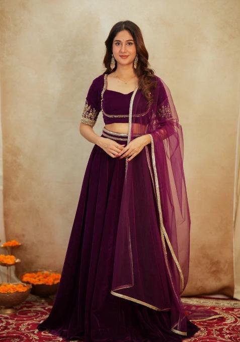 Purple Embroidery Velvet Lehenga Set — view on Indya