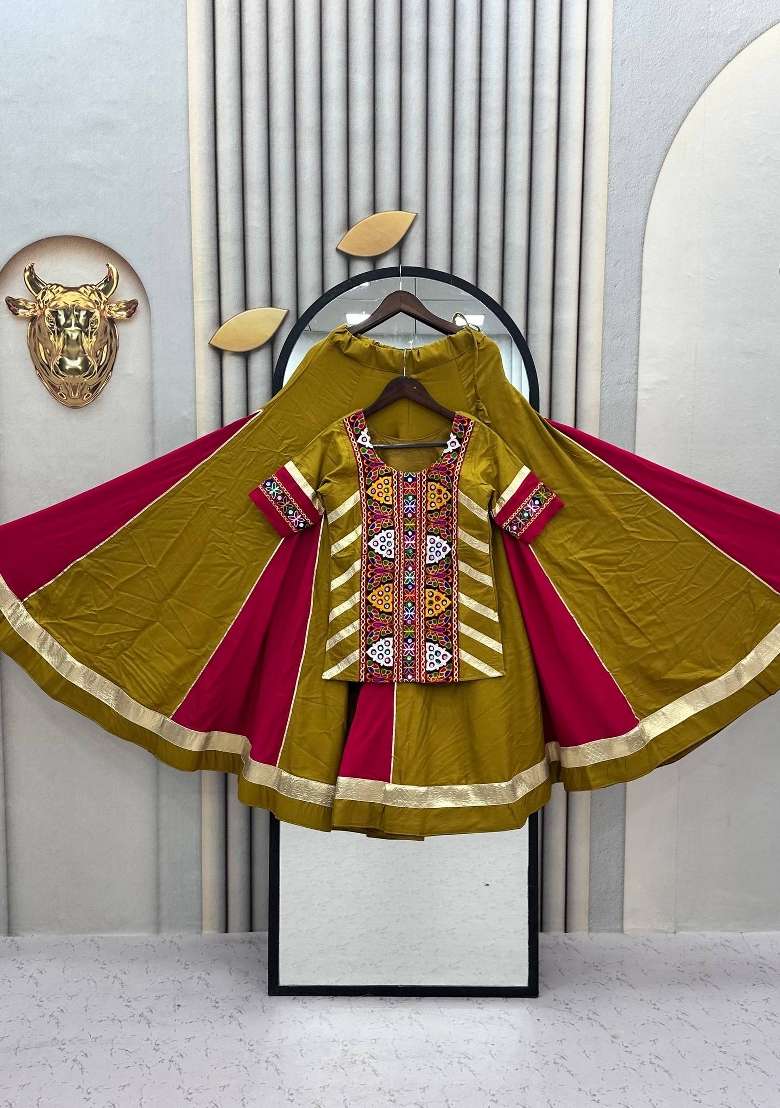 Mustard And Rani Pink Kutchi Work Cotton Chaniya Choli Set For Navratri And Garba for Diwali and Festive Wear - Indya