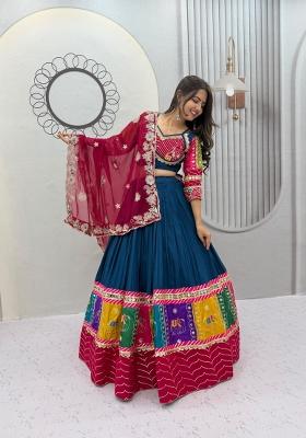 Peacock Blue And Rani Pink Sequin Work Georgette Navratri Lehenga Set