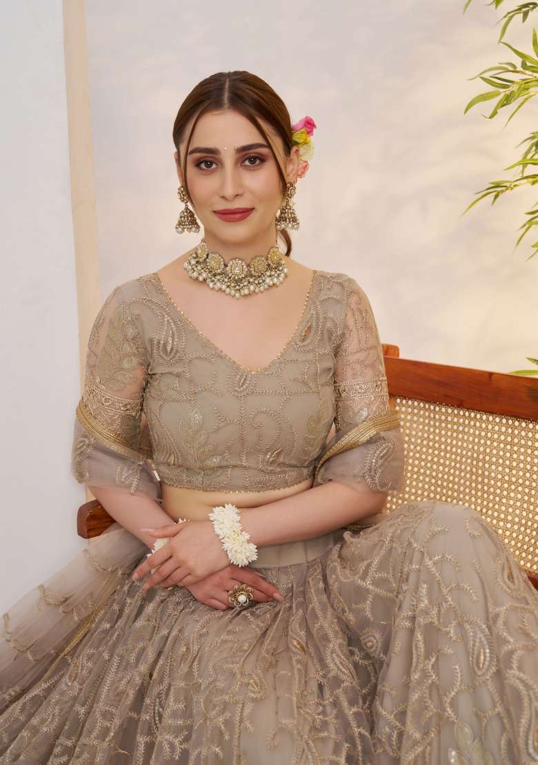 Muted Brownish Grey Thread Work Net Lehenga Set for Diwali and Festive Wear - Indya