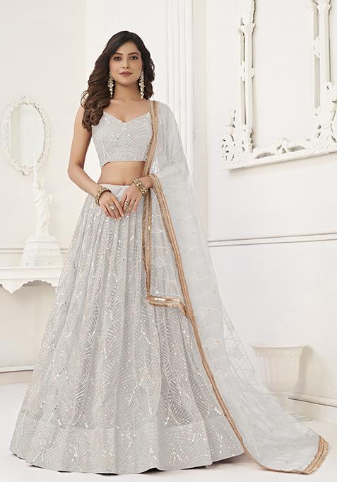 White Thread Embroidered Net Lehenga Set — view on Indya