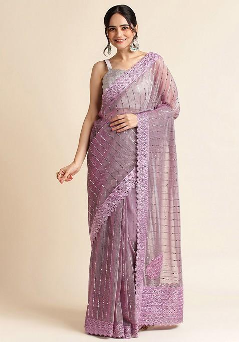 Purple Ethnic Motifs Embellished Saree Set