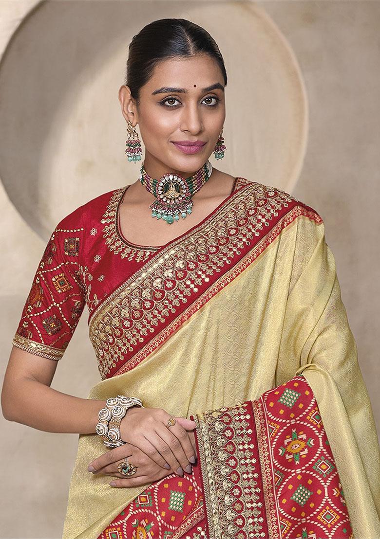 Cream Weaving Patola Sarees