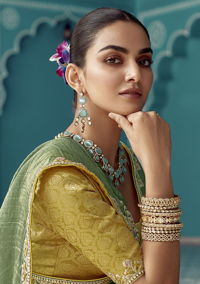 Green Embroidered Tissue Silk Sarees