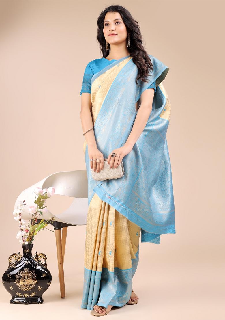 Cream And Sky Blue Woven Zari Work Banarasi Silk Saree Set