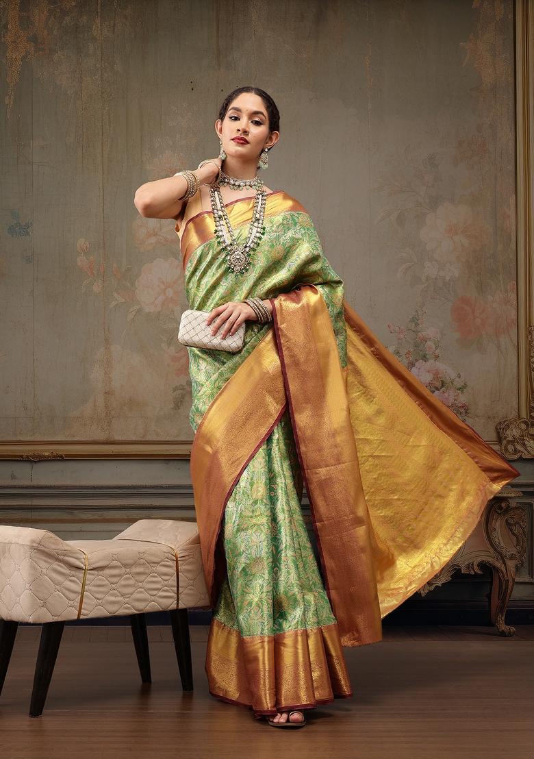 Green Woven Design Pure Silk Saree
