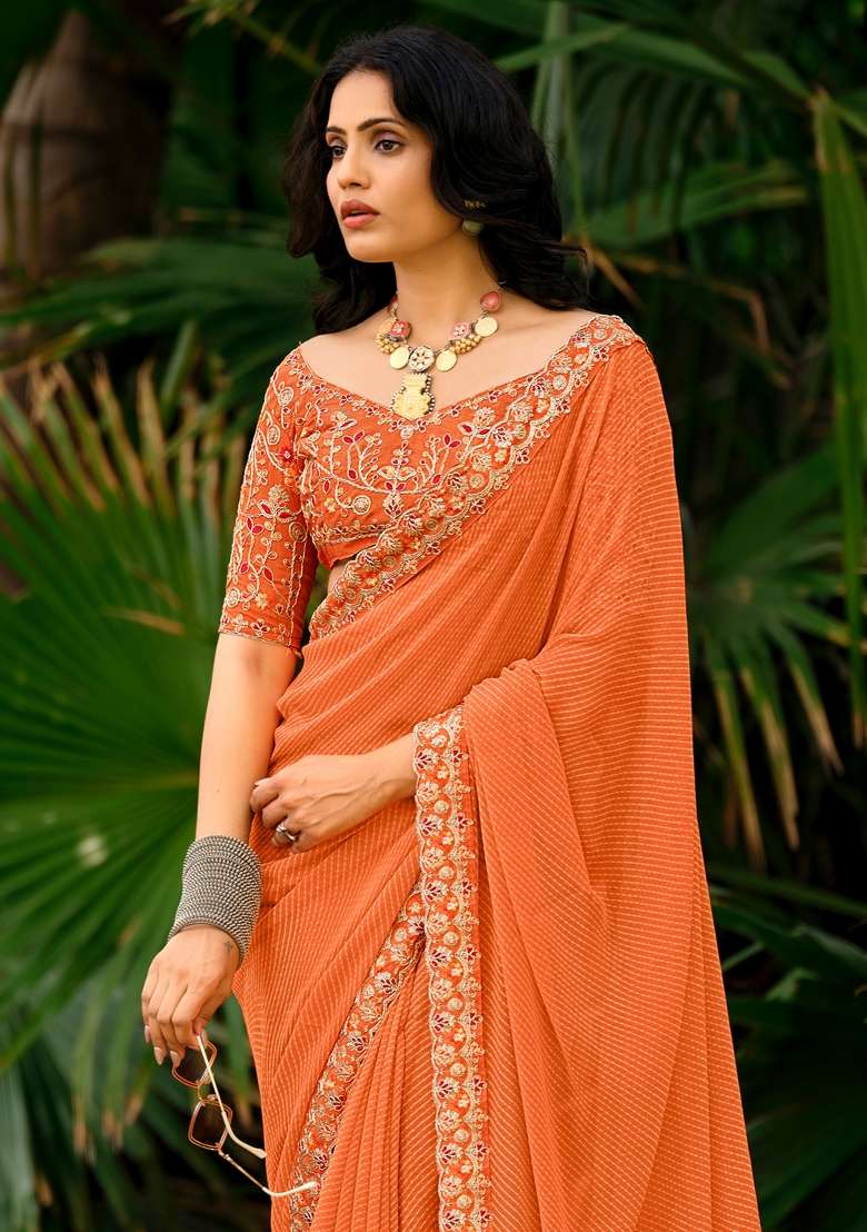 Orange Printed Georgette Saree Set for Diwali and Festive Wear - Indya