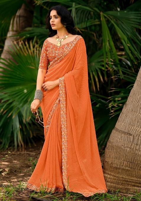 Orange Printed Georgette Saree Set — view on Indya