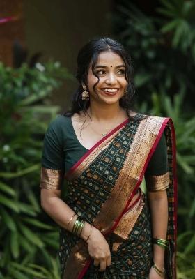 Green Woven Silk Sarees