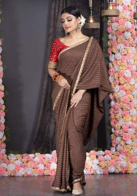 Brown Solid Georgette Saree Set — view on Indya